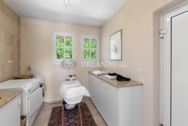 Villa de caractère avec vue panoramique sur le lac Léman, à deux pas de Genève